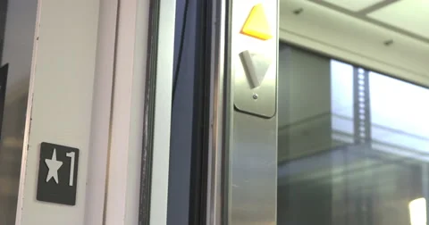 Elevator stops at first floor and opens 4k Stock Footage 51685952