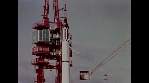 Elevator transports astronaut to entry platform for Mercury Spacecraft Capsule  Stock Footage 263292514
