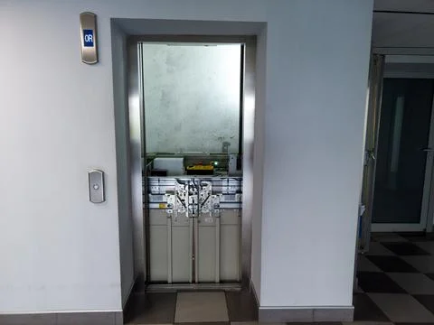 Elevator under maintenance. Broken elevator in open lift shaft. Out of servic Stock Photos