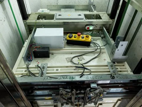 Elevator under maintenance. Broken elevator in open lift shaft. Out of servic Stock Photos