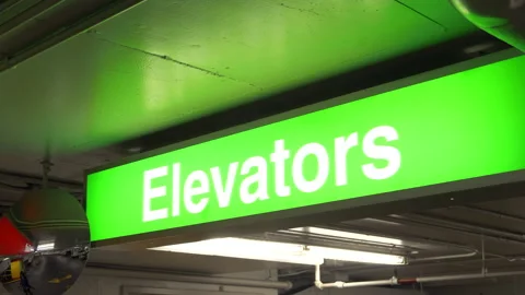 Elevators Sign Close Up, Information Signage Information Symbol, Direction Arrow Stock Footage 131063564