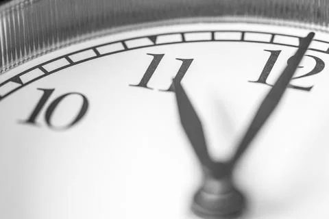 Eleven o'clock on clock face Stock Photos