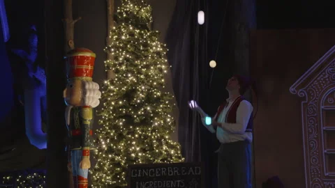Elf juggling glowing balls at Santa Claus Village in Rovaniemi, Finland Stock Footage 340481485