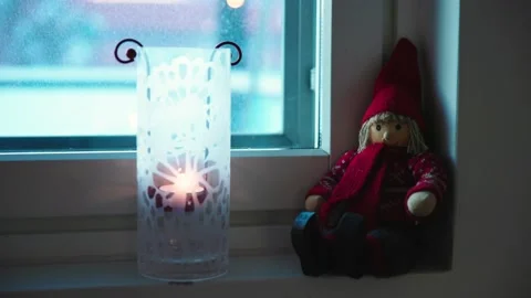 Elf sitting on windowsill 4k H.264 Stock Footage 168079278
