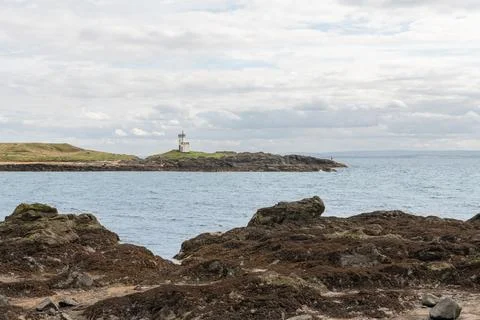 Elie Ness Lighthouse across Ruby Bay Wood Haven Stock Photos