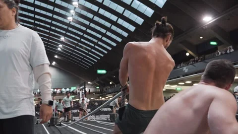 Elite Athletes Pulling Rope Sled During Competition Stock Footage 336660227