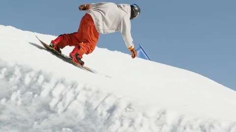 Elite freestyle snowboarder spinning through the air Stock Footage 113201095