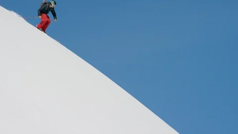 Elite skier cutting through fresh powder Stock Footage 113256238