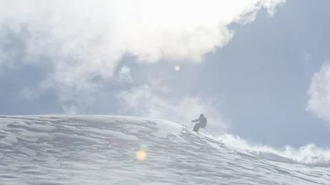 Elite skier speeding down snowy mountain slope Stock Footage 113221210