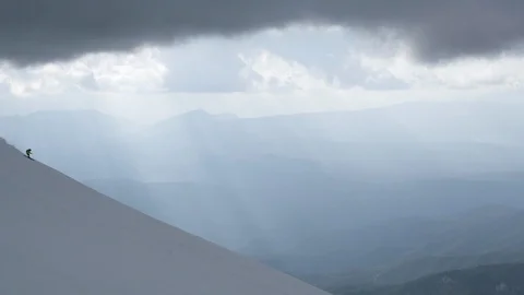 Elite skier speeding down steep mountain slope Stock Footage 113223653