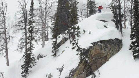 Elite skiier performing jumps snow covered mountain Video stock 116745140