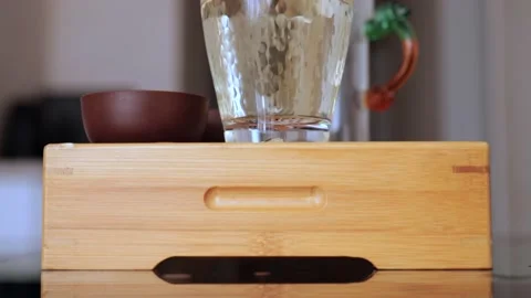 Elite white tea is ideally brewed in a glass cup. Chinese tea ceremony. Stock Footage 220342019