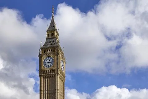 Elizabeth Tower clock face on a bright cloudy day Stock Photos