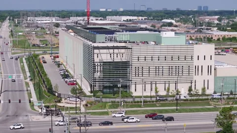 ELK GROVE VILLAGE, IL - A drone aerial view looking at the exterior facade of Stock Footage 342586830