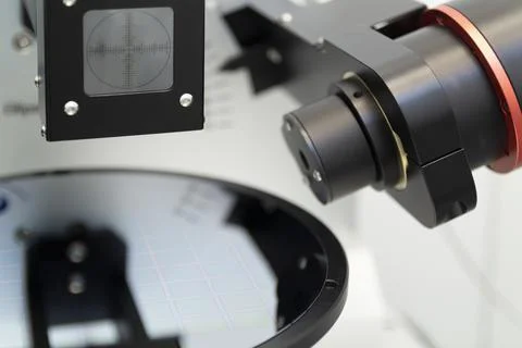 Ellipsometer tool in a laboratory. Silicon wafer of purple color measure thic Stock Photos