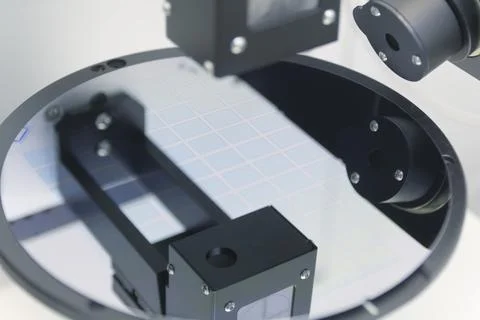 Ellipsometer tool in a laboratory. Silicon wafer of purple color measure thic Stock Photos