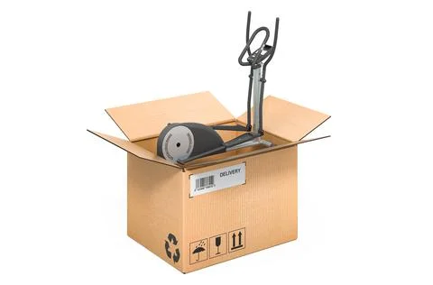 Elliptical trainer inside cardboard box, delivery concept. 3D rendering Illustrazione stock