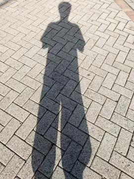 Elongated Shadow: Abstract &amp; Intriguing Stock Photos