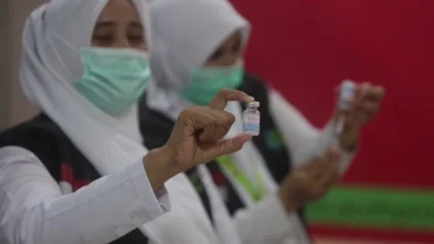 EMA approves third shot of Moderna vaccine for general population, Madrid, ES -  Stock Footage 204071013