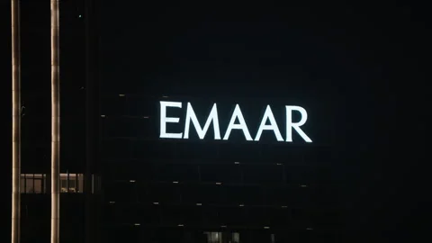 Emaar sign on Dubai tower in UAE at night Stock Footage 344916704