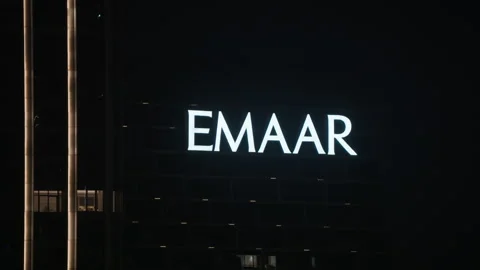 Emaar sign grows larger on Dubai skyscraper in UAE Stock Footage 344917265