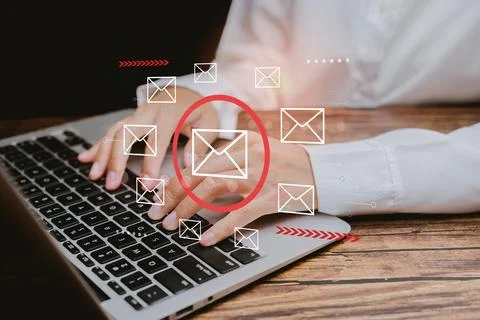 Email concept. Hands Typing on Laptop with Floating Email Icons and Notific.. Stock Photos