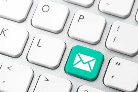 Email &amp; contact us icon on computer keyboard Stock Photos