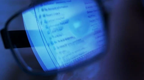 Email list reflected in man's glasses Stock-Footage 61832071