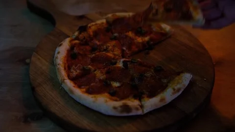 Emale hands taking slices of pizza with cheese, tomato sauce. Slow motion food Stock Footage 240933098