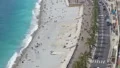 Embankment and beach in Nice resort city, people enjoying vacation in France HD Footage