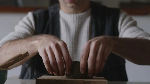 Embark on a captivating journey into the world of a skilled Latino artisan Stock Footage 258566537