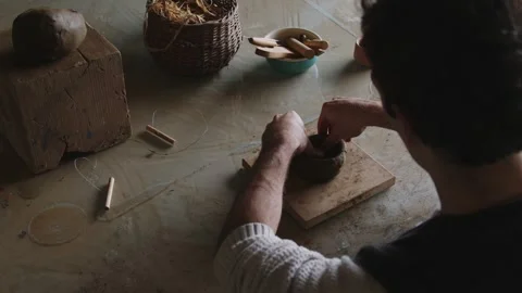 Embark on a captivating journey into the world of a skilled Latino artisan Stock Footage 258584855