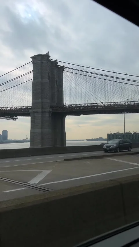 Embark on Urban Drive featuring breathtaking view of Scenic Bridge along the way 스톡 동영상 291633625