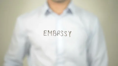 Embassy , man writing on transparent scr... | Stock Video | Pond5