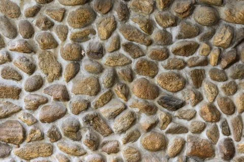Embed stone in cement wall, texture and pattern Stock Photos