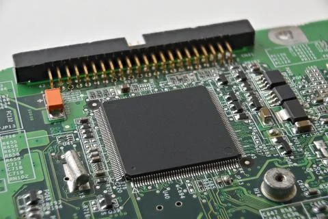 Embedded Microcontroller on Green PCB Stock Photos