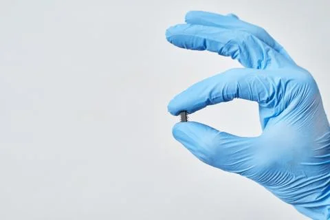 Embedding the chip under human skin, microcontroller implanting NFC technolog Stock Photos
