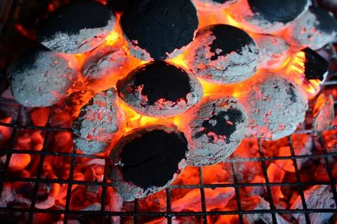 Ember on grill Stock Photos