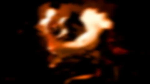 Ember with playing tongues of flame in the dark, glow, shine Stock Footage 129568943