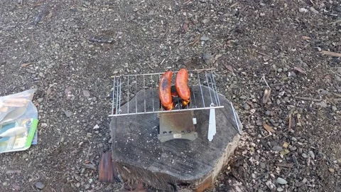 Emberlit stove cooking 2 Vídeo Stock 174532867
