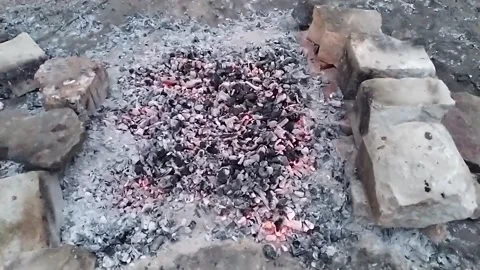 Embers after a fire Stock Footage 166051658