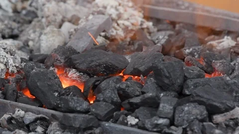 Embers glow in a iron forge. Stock Footage 120260401