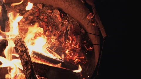 Embers Moved in Campfire Stock Footage 49354060