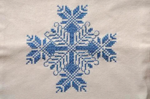 Emboidered snow flake Stock Photos