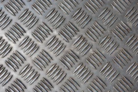 Embossed metal abstract pattern texture background Stock Photos