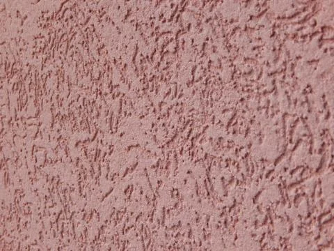 Embossed pink surface of the wall Stock Photos