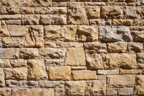Embossed stone bricks wall 스톡 사진