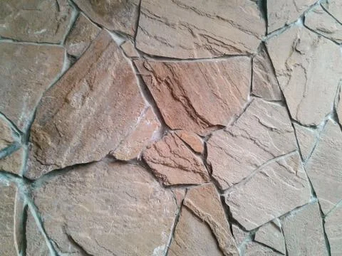 Embossed stone wall Stock Photos