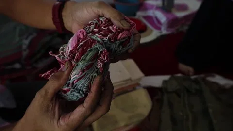 Embossed yarn, to make batik fabric Stock-Footage 304848744