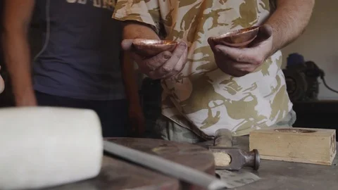 The embosser connects two halves of the workpiece to get the ball. Stock Footage 94937506